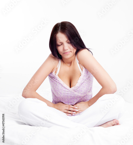 Photo: girl has a stomachache girl has a stomachache