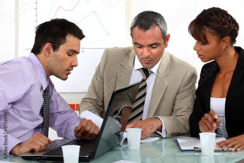 Photo: A group of businesspeople having a meeting A group of businesspeople having a meeting