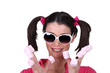 Woman in pigtails eating marshmallows