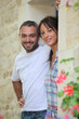 Couple standing in a doorway