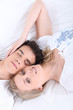 Foto: Couple taking an afternoon nap Couple taking an afternoon nap