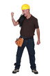 craftsman raising his fist and laughing