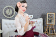 Beautiful young lady drinking a tea