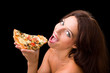 young woman eating a piece of pizza