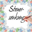 Hand mit Stift schreibt Steuersenkung