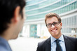Photo: Businessmen outdoor meeting Businessmen outdoor meeting