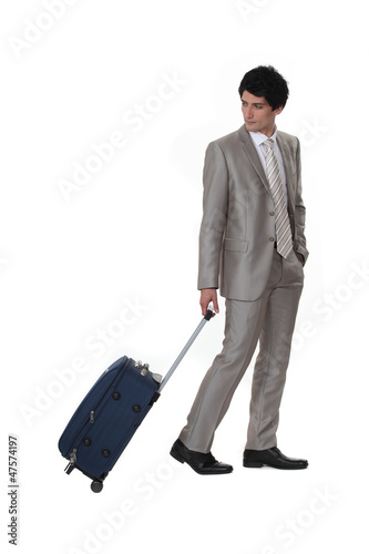 Photo: A businessman leaving on a business trip A businessman leaving on a business trip