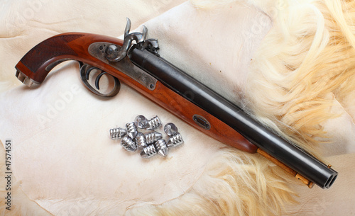Photo: Vintage large-bore pistol. British colonial weapon. Vintage large-bore pistol. British colonial weapon.