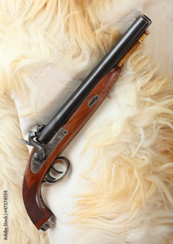 Photo: Vintage large-bore pistol. British colonial weapon. Vintage large-bore pistol. British colonial weapon.