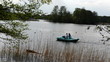 Fast scene romantic couple on water bicycle pedalo dolphin shape