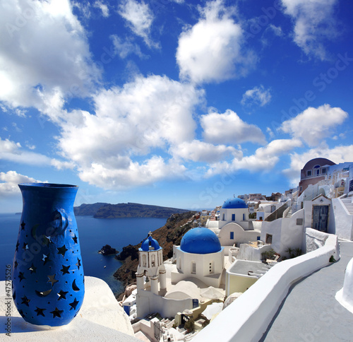 Santorini with  old architecture, churches against sea in Greece