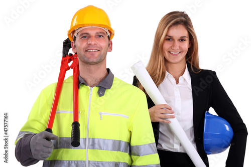 Photo: portrait of fine-looking female architect and workman portrait of fine-looking female architect and workman