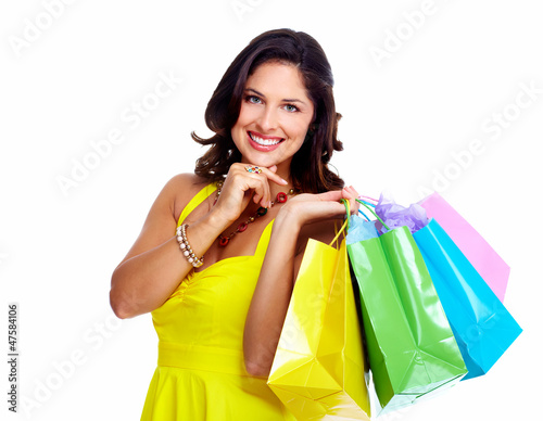 Photo: Beautiful woman with a shopping bag. Beautiful woman with a shopping bag.