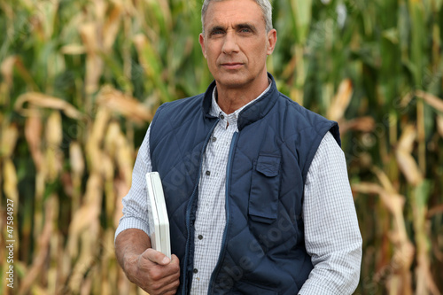 Photo: Farmer with computer Farmer with computer