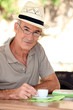 Senior man with an expresso