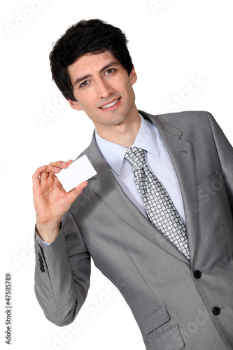Illustration: portrait of handsome businessman holding business card portrait of handsome businessman holding business card