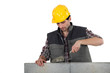 Man with trowel and cement