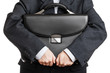 Hand holding briefcase