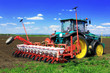 Tractor plowing the fields in early spring.