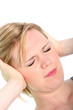 Woman with a migraine holding her head