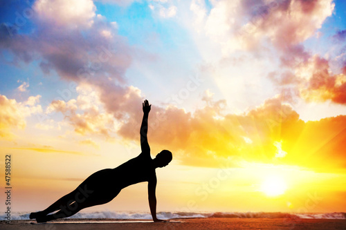Photo: Yoga silhouette on the beach Yoga silhouette on the beach
