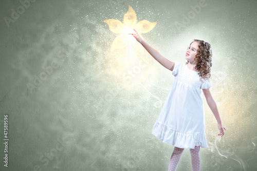 Photo: Child with magic light Child with magic light