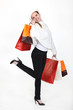 Happy woman holding shopping bags