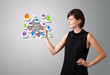 woman holding modern tablet with colorful shopping bags on cloud