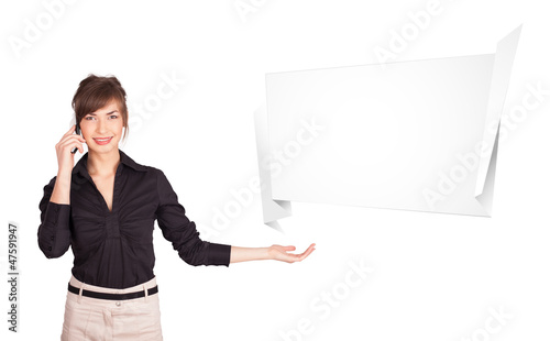 Photo: young woman presenting abstract origami copy space young woman presenting abstract origami copy space