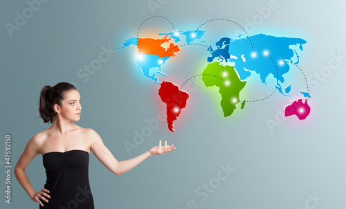 Photo: Young woman presenting colorful world map Young woman presenting colorful world map