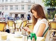 Attractive Woman Reading a Text Message