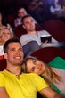 Romantic couple at movie theater