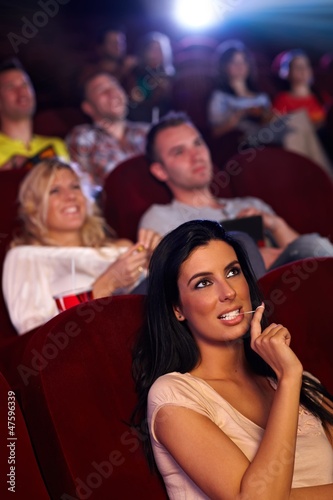 Photo: Pretty girl in multiplex movie theater Pretty girl in multiplex movie theater
