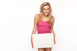 Woman in lingerie with a blank board
