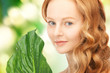 woman with green leaf