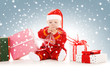 Photo: santa helper baby with christmas gifts santa helper baby with christmas gifts