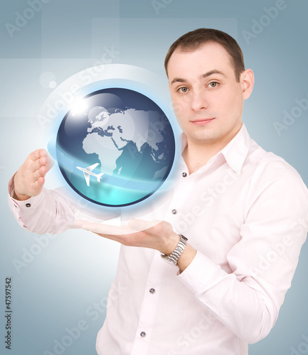 Photo: earth globe on the palms of his hands earth globe on the palms of his hands