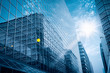 Photo: modern glass building under the blue sky modern glass building under the blue sky