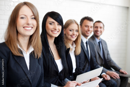 Photo: Successful businesswoman in group of people Successful businesswoman in group of people
