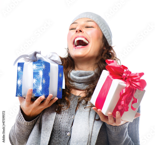 Photo: Happy Young Woman With Christmas Gifts. Gift Box Happy Young Woman With Christmas Gifts. Gift Box