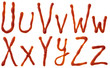 Alphabet letters made from tomato, ketchup syrup