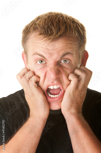 Photo: Angry Man Clawing His Face Angry Man Clawing His Face