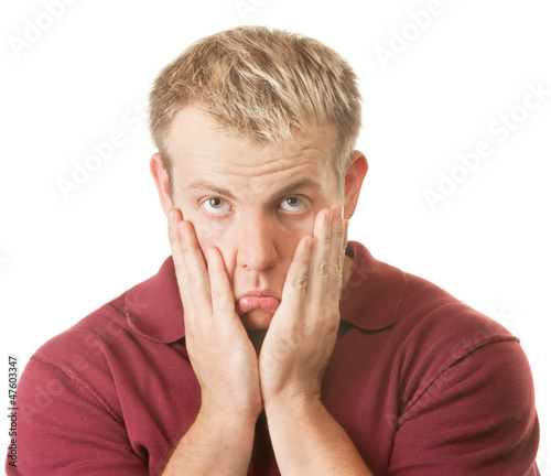 Photo: Sad Man Pulling on Face Sad Man Pulling on Face