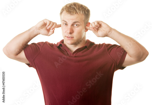 Photo: Man With Fingers in Ears Man With Fingers in Ears