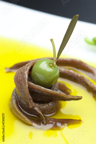 Photo: anchovies in oil whith olives tapa anchovies in oil whith olives tapa