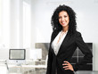 Smiling businesswoman in her office