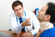 Doctor visiting a patient in his studio