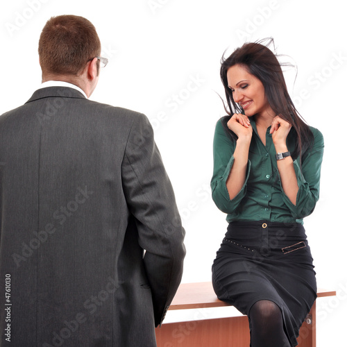 Photo: Colleagues flirting at job Colleagues flirting at job