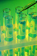 test-tubes with liquid on blue background