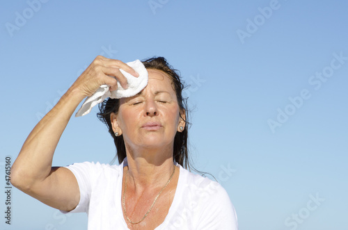 Photo: Mature woman exercise stress sweating Mature woman exercise stress sweating
